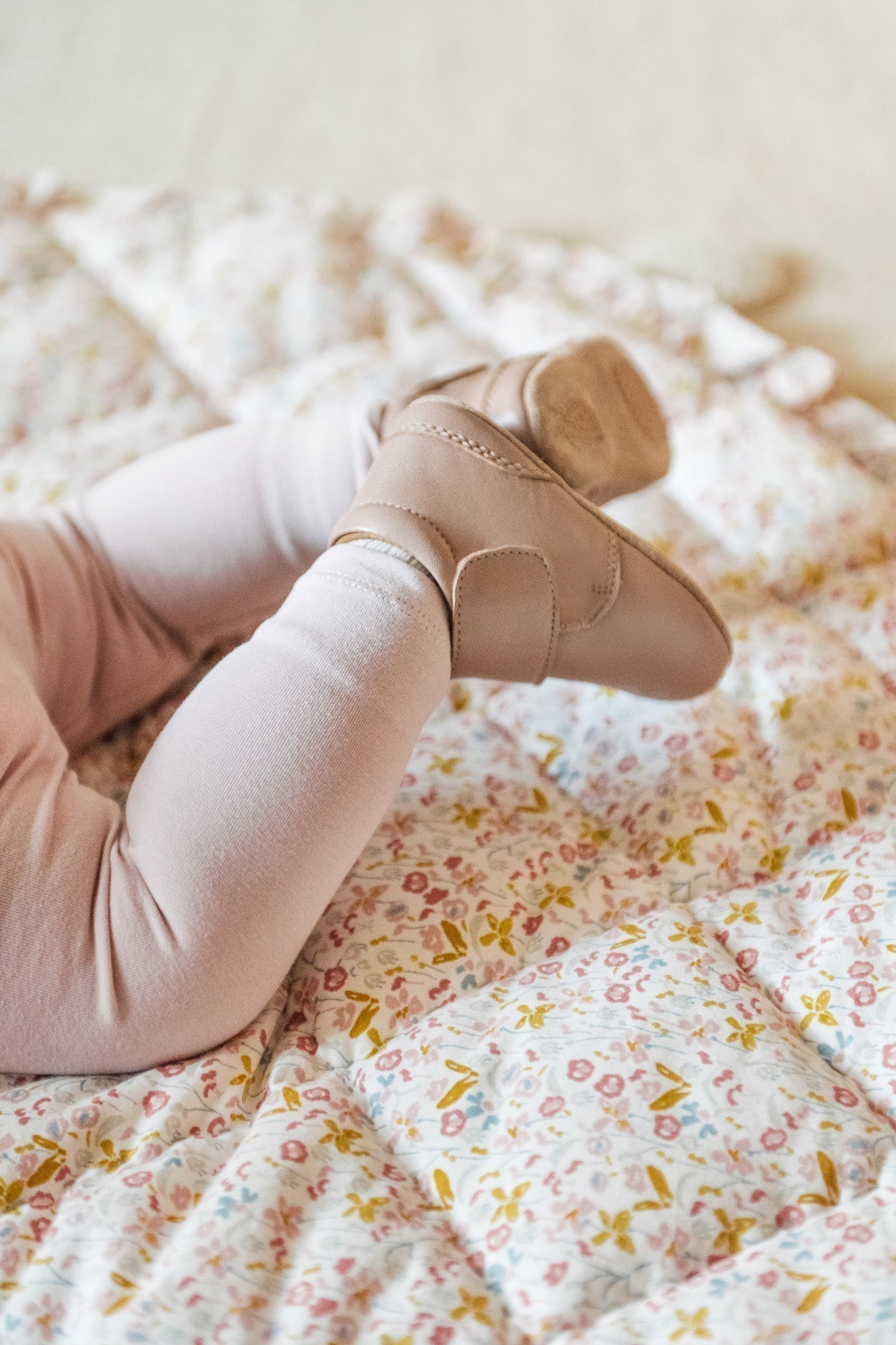 Floral Play Mat with baby's legs shown overtop